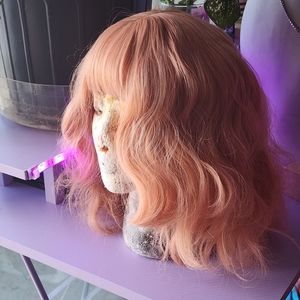 Peach shoulder length wavy wig
